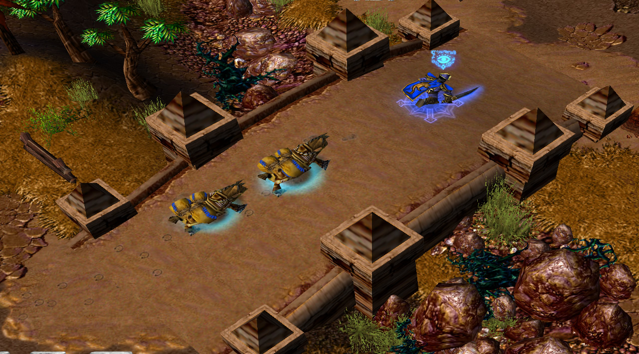 A pirate-looking unit with a True Sight indicator leads two pack mules over a bridge in the desert
