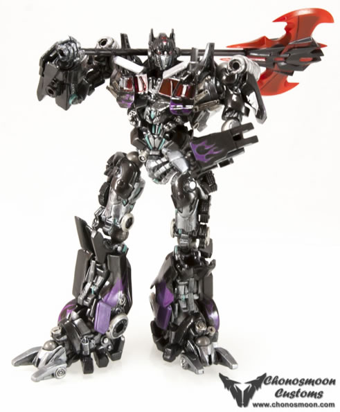 A complicated black silver and purple transformer with a large orange axe