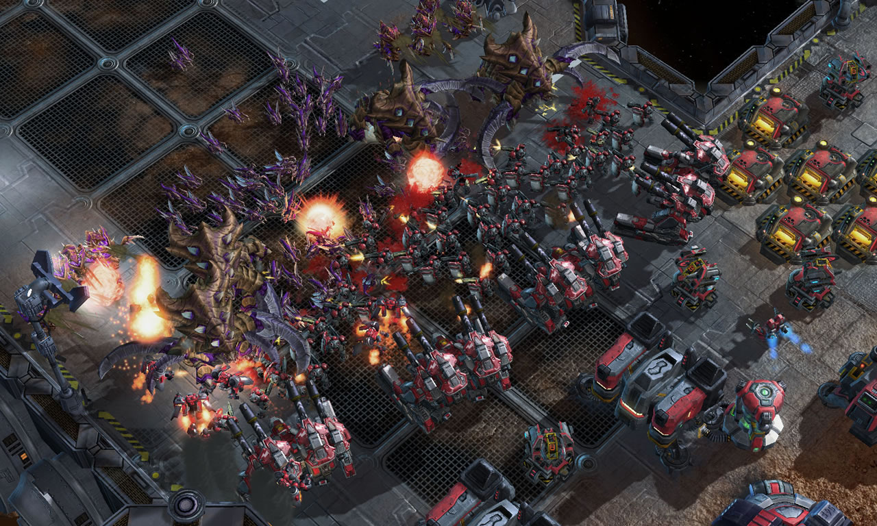 Picture of gameplay from Starcraft II featuring a large number of units engaging in combat